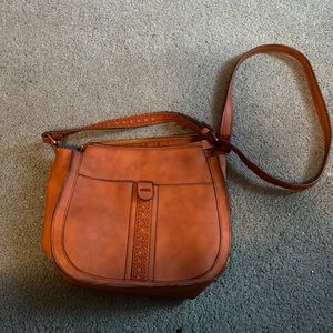 Brown cross body purse.